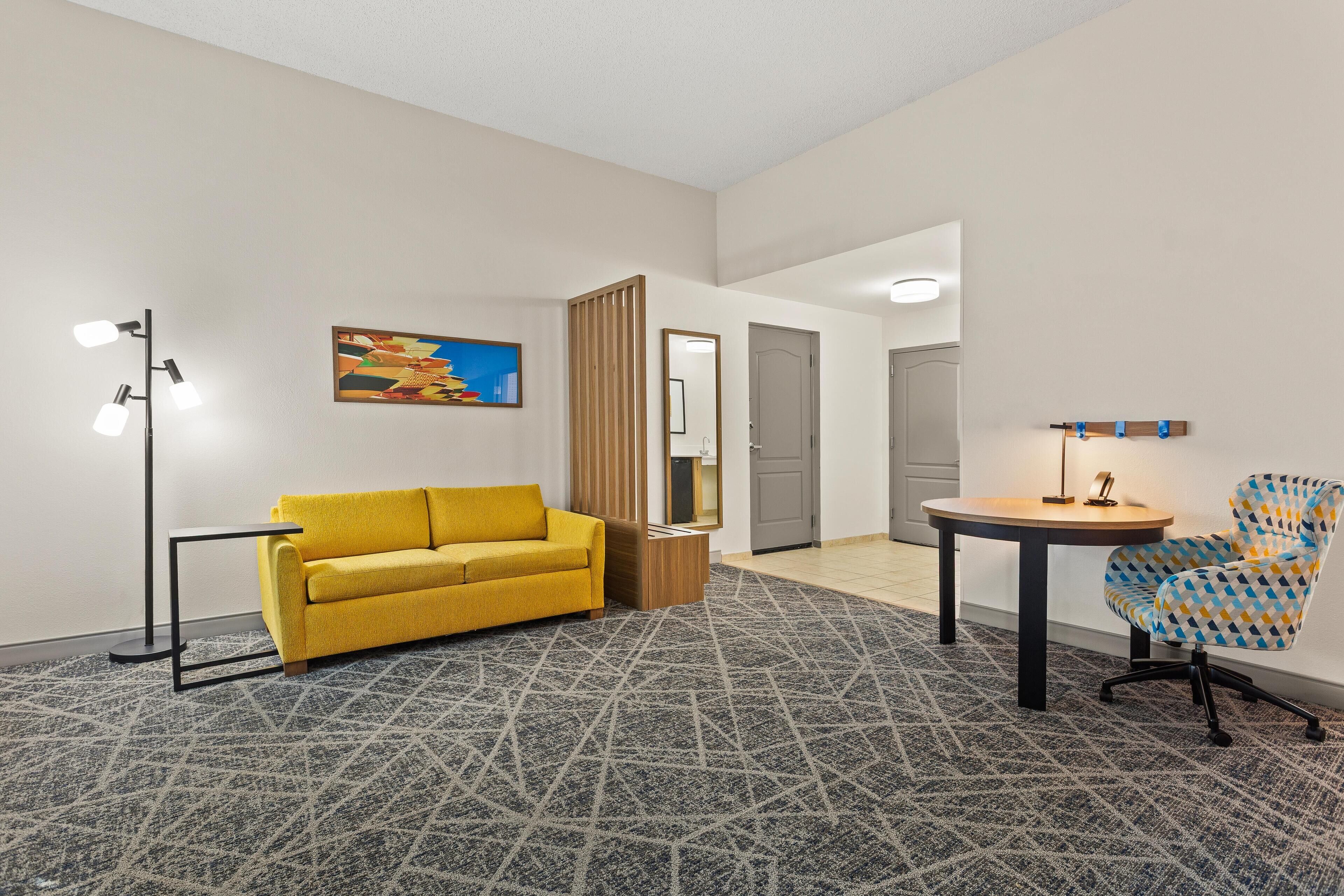 Studio, 1 King Bed, Accessible, Non Smoking | Living area | 25-inch flat-screen TV with cable channels, TV