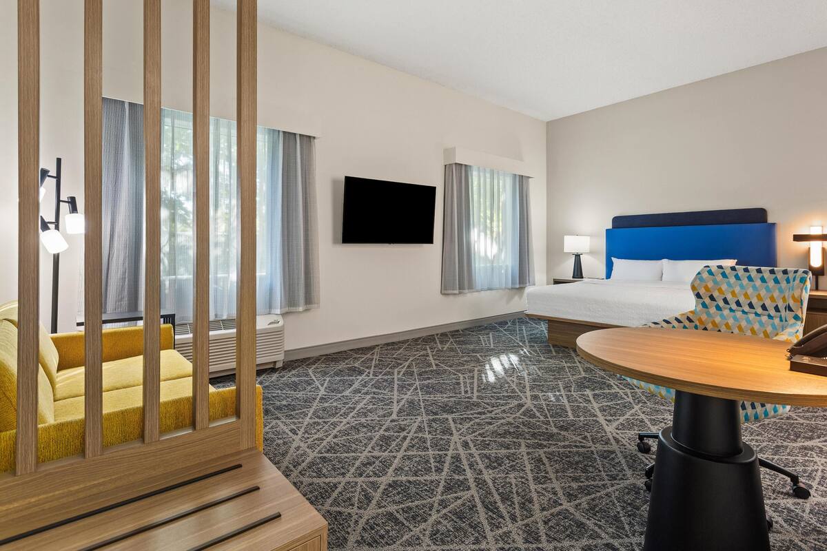 Studio, One King Bed, Non-Smoking | Living area | 25-inch flat-screen TV with cable channels, TV
