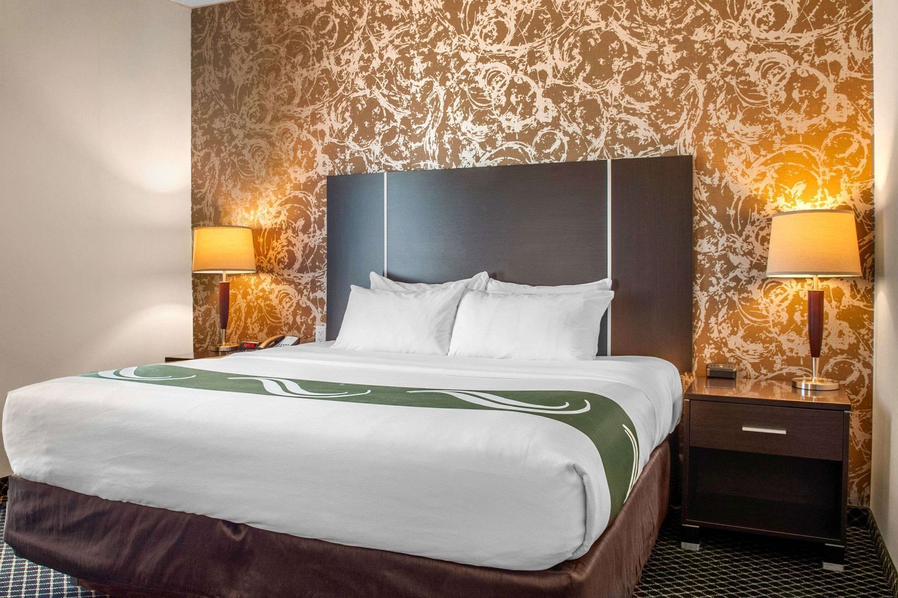 Pillow-top beds, laptop workspace, blackout curtains, iron/ironing board