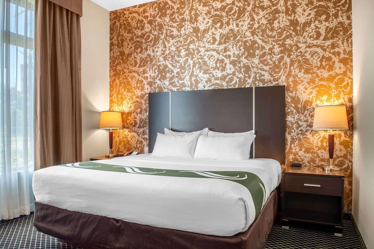 Pillow-top beds, laptop workspace, blackout curtains, iron/ironing board