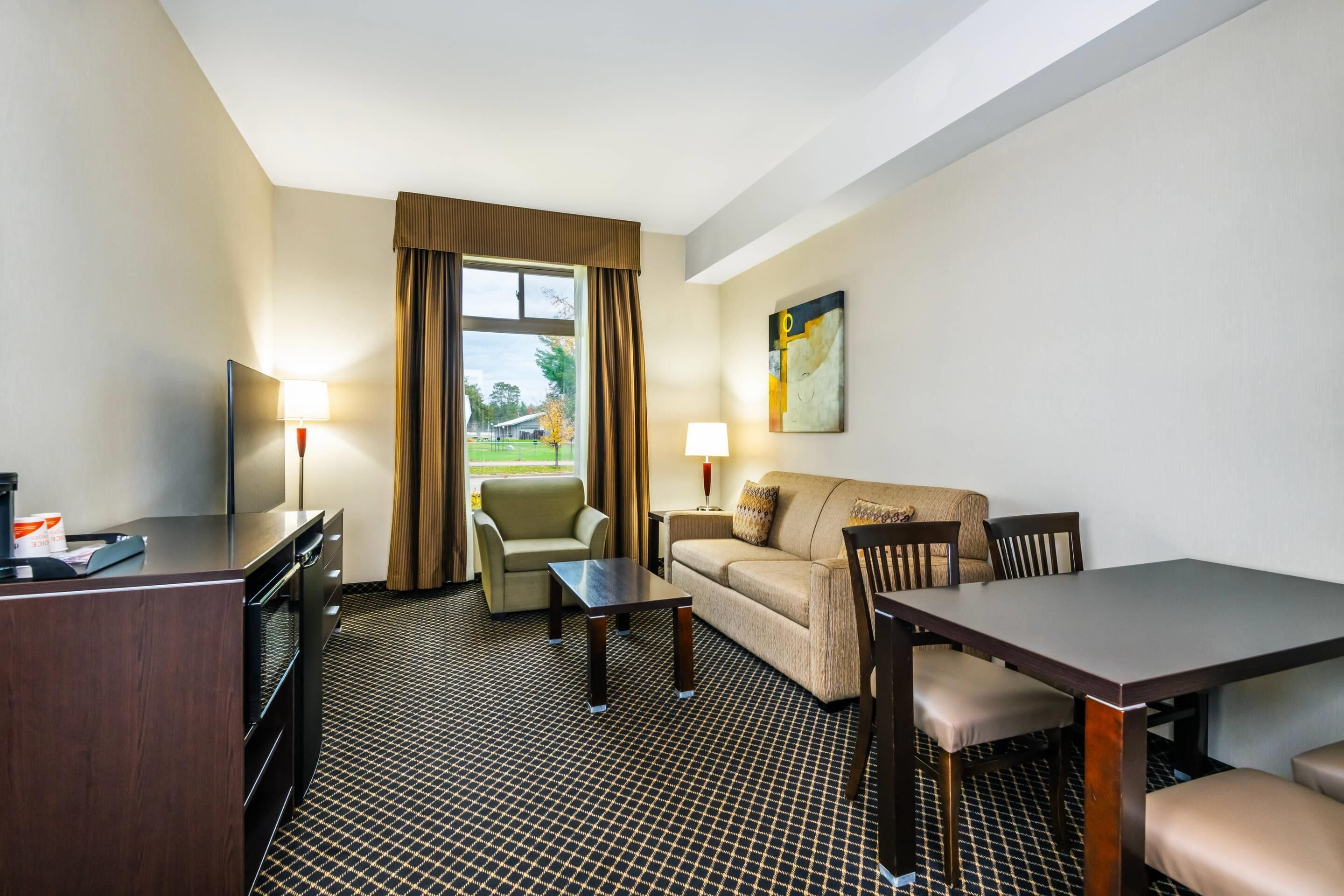 Pillow-top beds, laptop workspace, blackout curtains, iron/ironing board