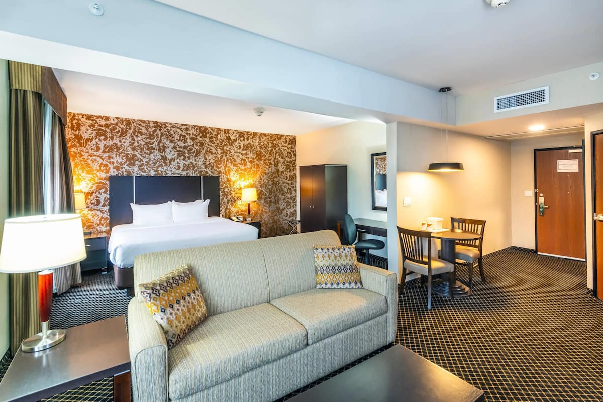 Pillow-top beds, laptop workspace, blackout curtains, iron/ironing board