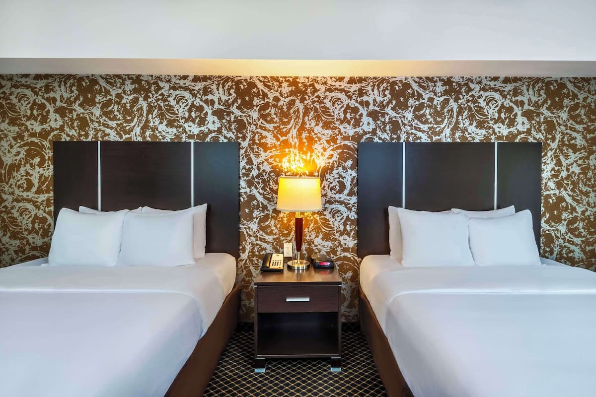 standard room, 2 queen beds, non smoking | 1 bedroom, pillow-top beds, laptop workspace, blackout curtains