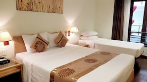 Deluxe triple room with double and single bed