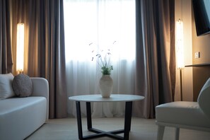 Suite, 1 chambre | Coin séjour