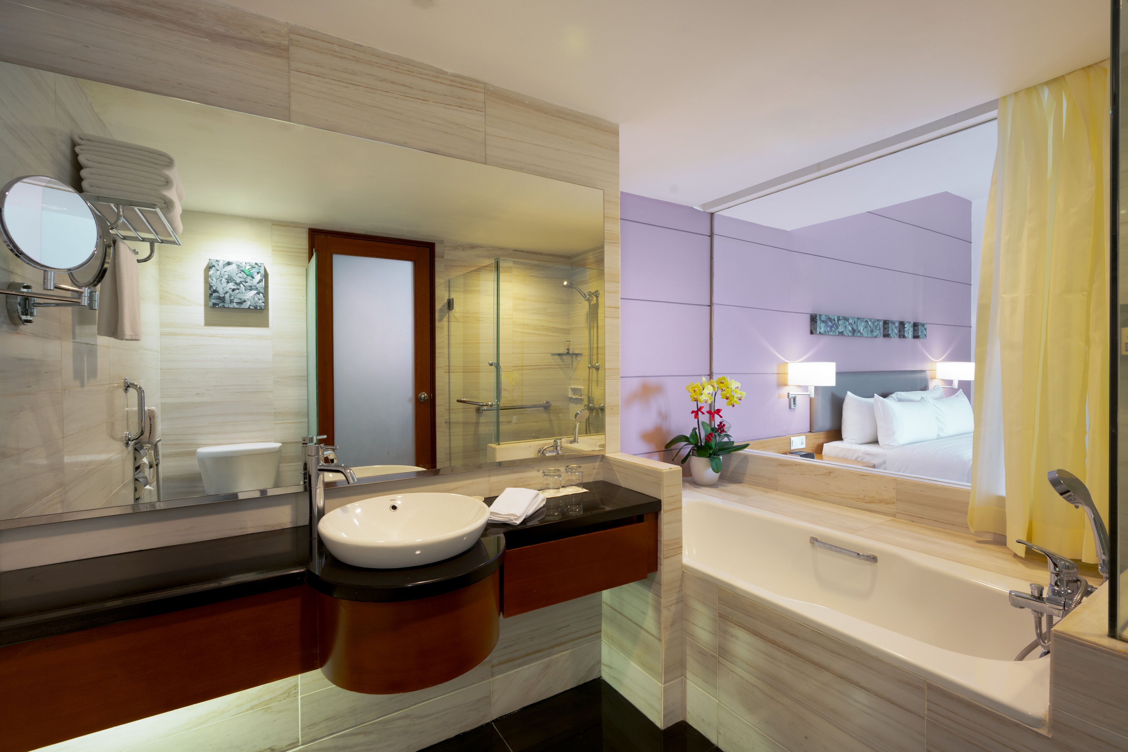 junior suite | bathroom | shower, free toiletries, hair dryer, slippers
