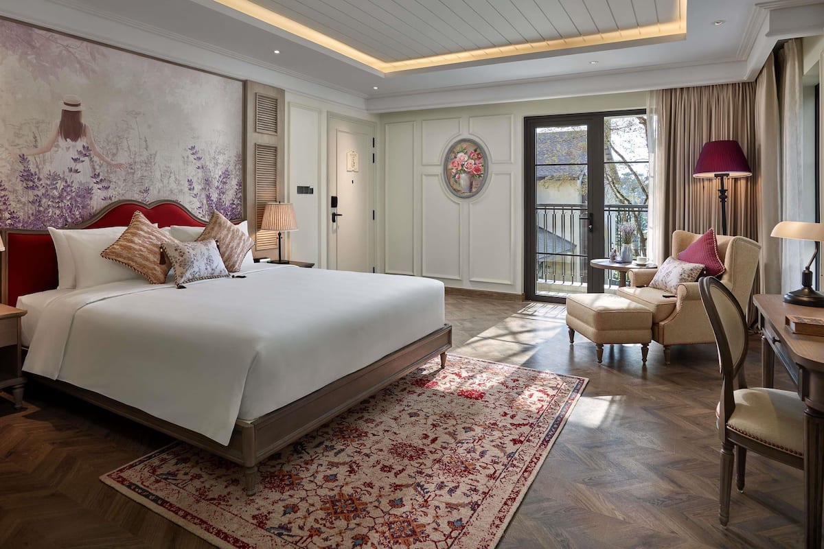 Quarto executivo, 1 cama King (Executive Pass) | Edredons de pluma, frigobar, cofres nos quartos, escrivaninha