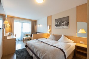 Ropa de cama de alta calidad, caja fuerte, escritorio y wifi gratis