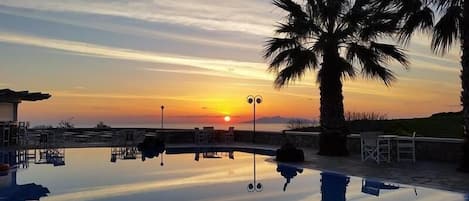 Seasonal outdoor pool, pool umbrellas, sun loungers