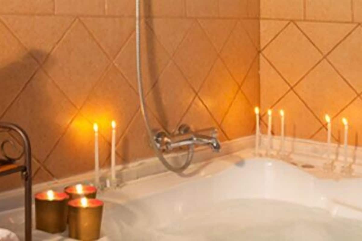 superior double room (hidromassage bath) | bathroom | hair dryer, towels