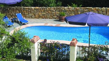 Seasonal outdoor pool, pool umbrellas, sun loungers