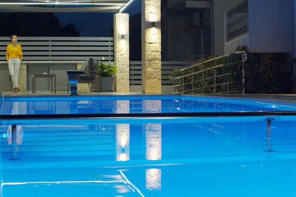 Seasonal outdoor pool, open 9:00 AM to 6:00 PM, sun loungers