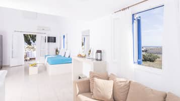 Honeymoon Villa, Jetted Tub, Sea View | Living room | 21-inch plasma TV with digital channels, TV