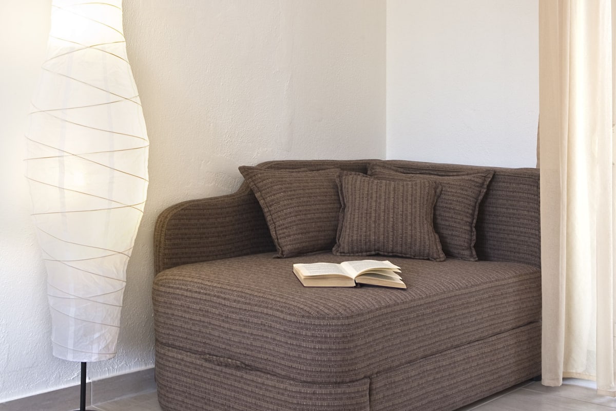 suite, 1 queen bed with sofa bed | living area | 32-inch flat-screen tv with satellite channels, tv