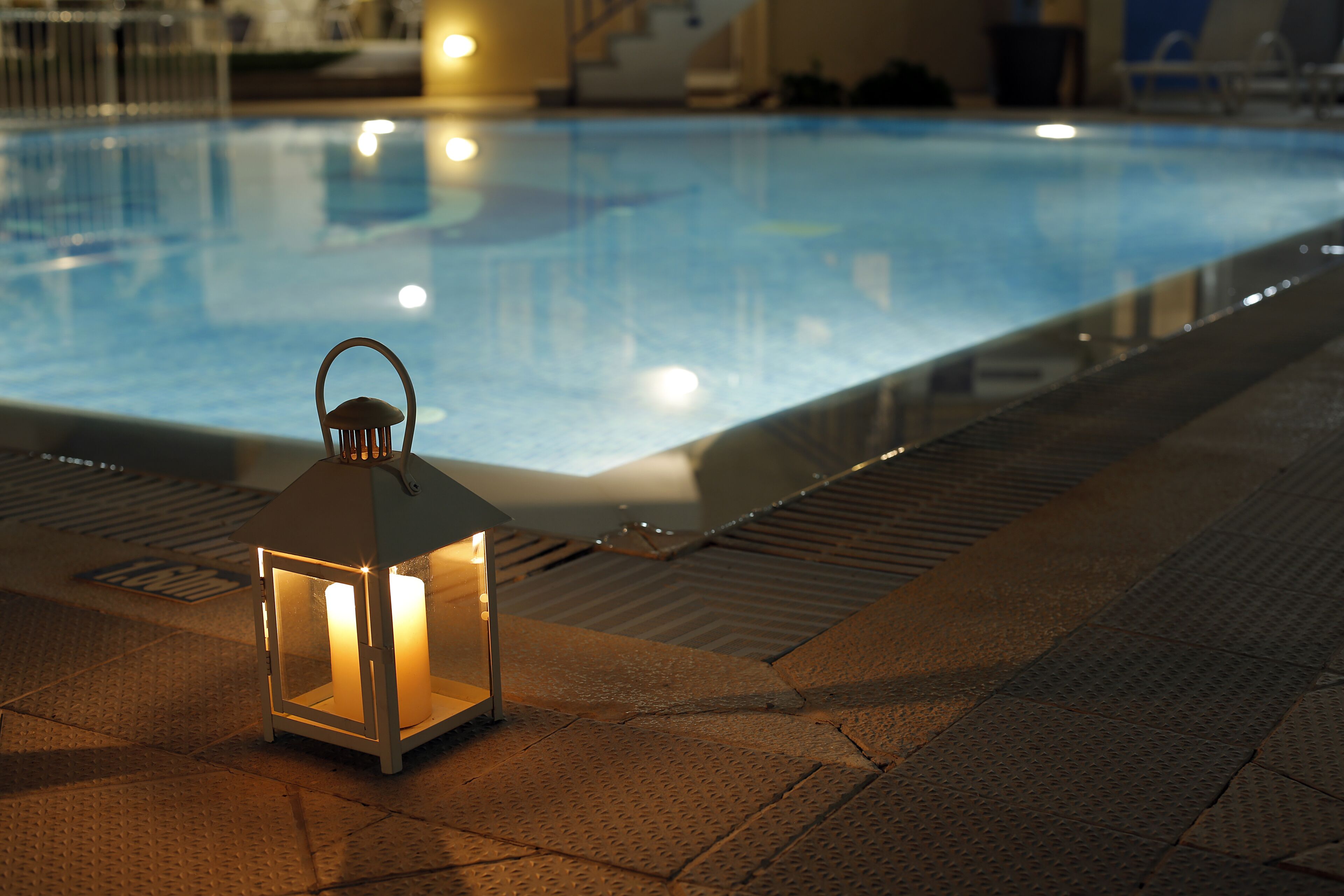 outdoor pool, pool umbrellas, pool loungers