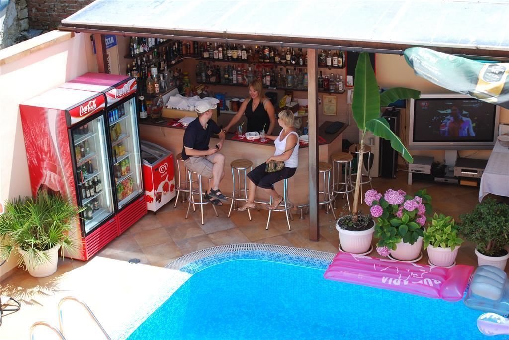 seasonal outdoor pool, pool umbrellas, pool loungers