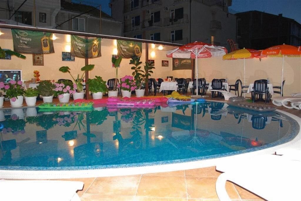 seasonal outdoor pool, pool umbrellas, pool loungers