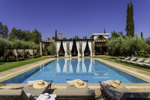Outdoor pool, pool umbrellas, pool loungers