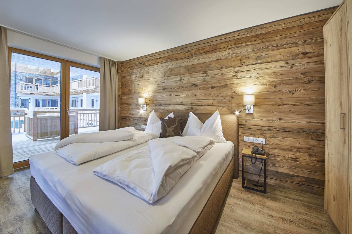 alpine classic spa | 1 bedroom, premium bedding, in-room safe, individually decorated