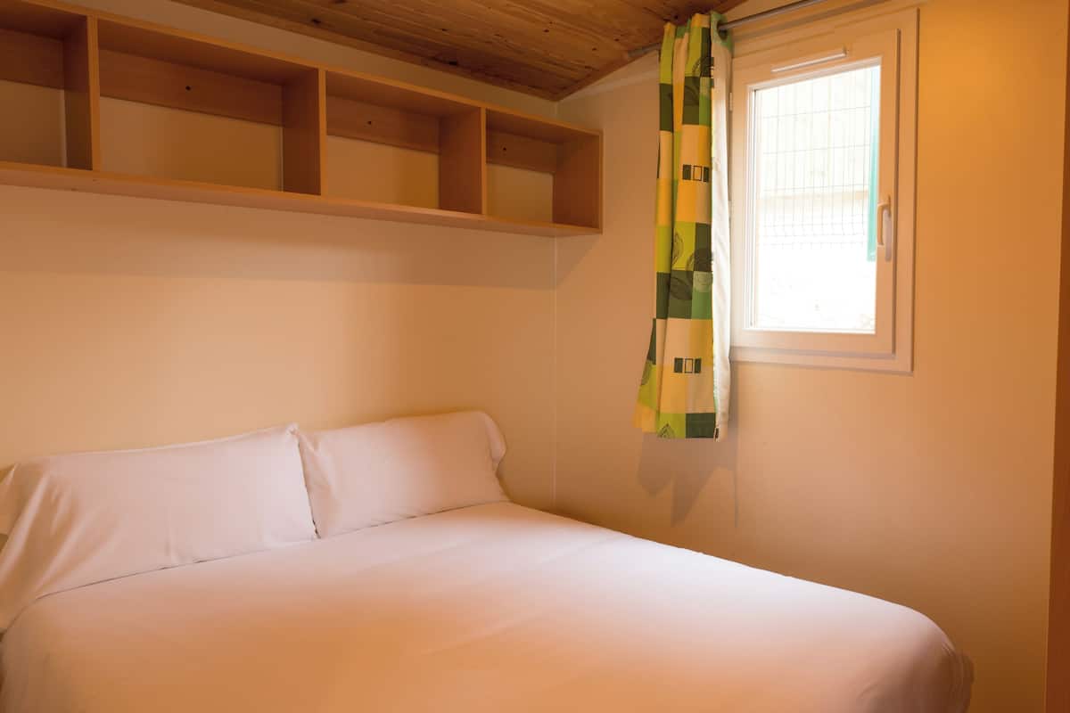 Basic Bungalow | 3 bedrooms, down comforters, individually furnished, laptop workspace