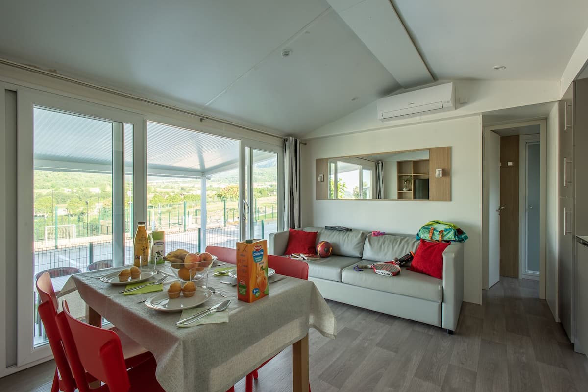 Family Mobile Home | Living area | 43-inch LED TV with satellite channels, table tennis, heated floors