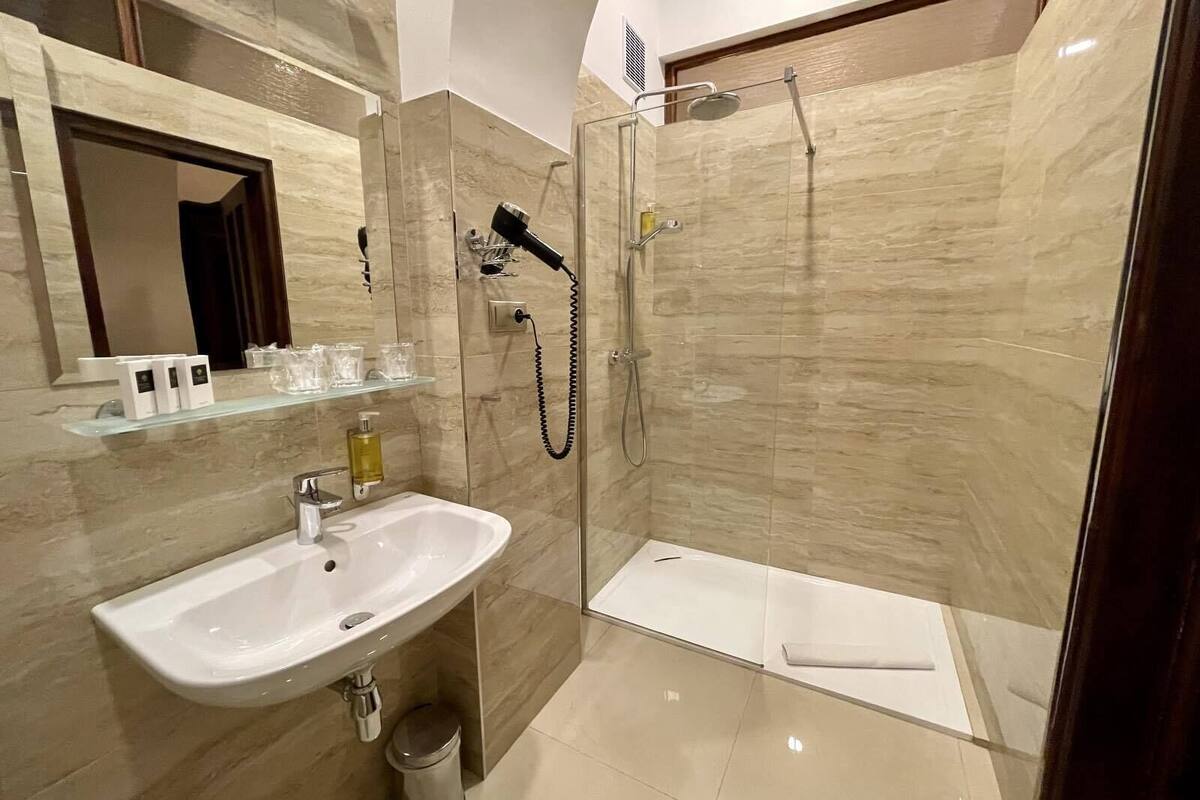 comfort triple room | bathroom | free toiletries, hair dryer, bathrobes, slippers