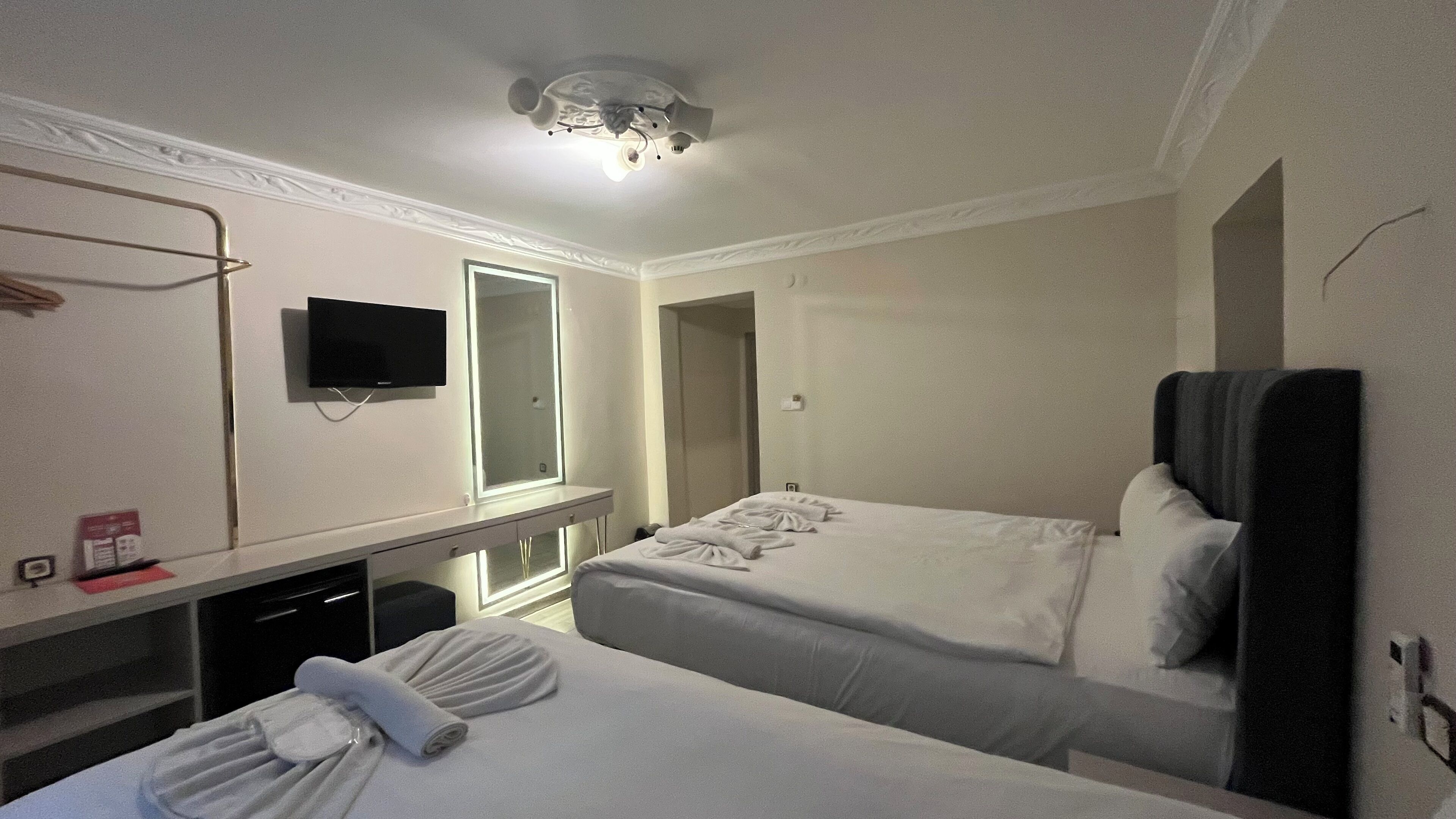 Economy Triple Room, Ground Floor | Premium bedding, pillowtop beds, minibar, in-room safe