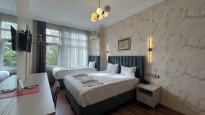 Deluxe Triple Room, Sea View | Premium bedding, pillowtop beds, minibar, in-room safe - Tulip House (Istanbul)