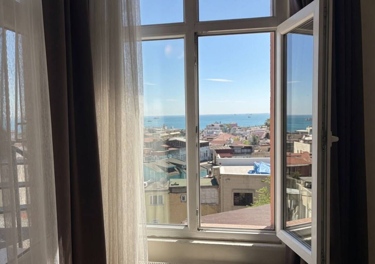 Deluxe Triple Room, Sea View | Premium bedding, pillowtop beds, minibar, in-room safe