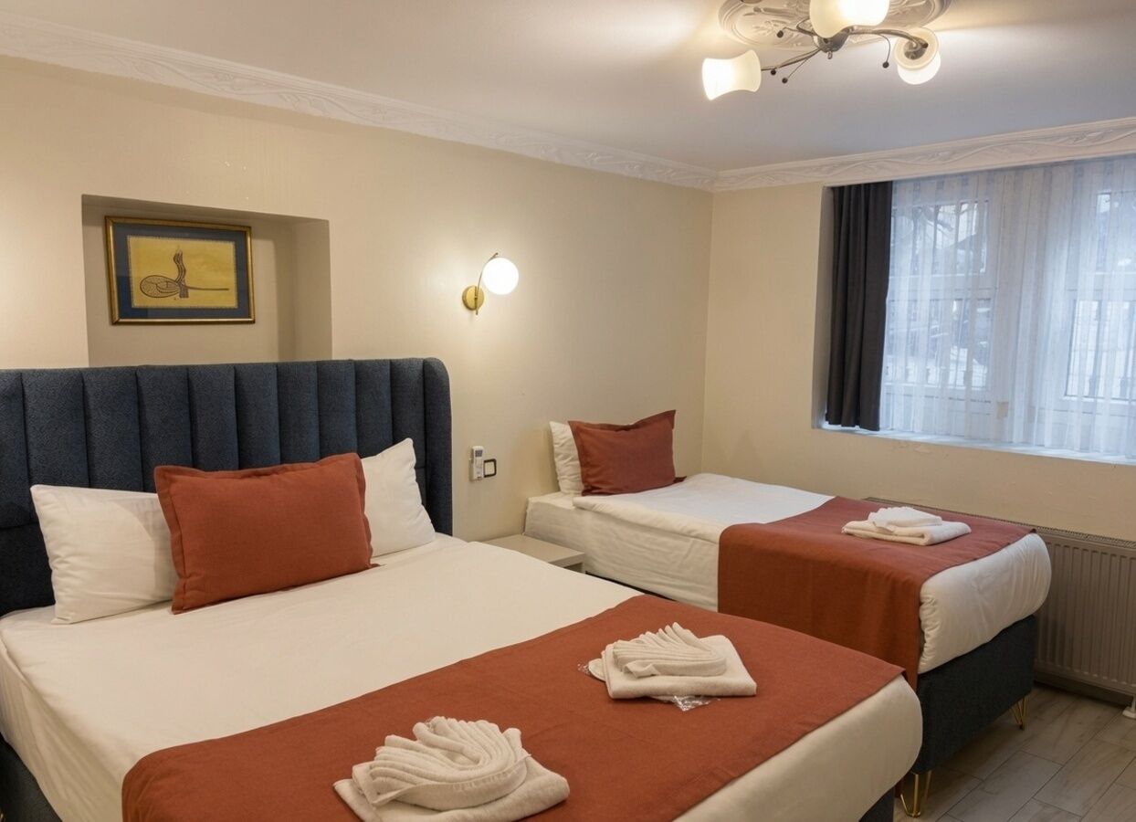 Economy Triple Room, Ground Floor | Premium bedding, pillowtop beds, minibar, in-room safe