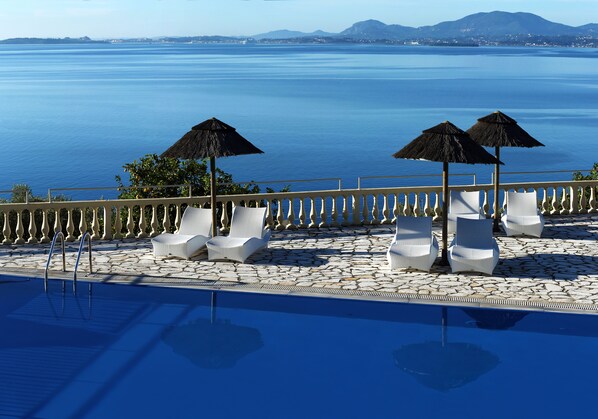 2 outdoor pools, pool umbrellas, pool loungers