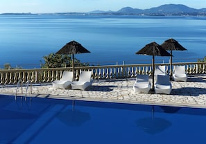 2 outdoor pools, pool umbrellas, pool loungers