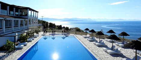 2 outdoor pools, pool umbrellas, sun loungers