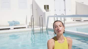 Relax by the pool surrounded by clean lines and a serene atmosphere.