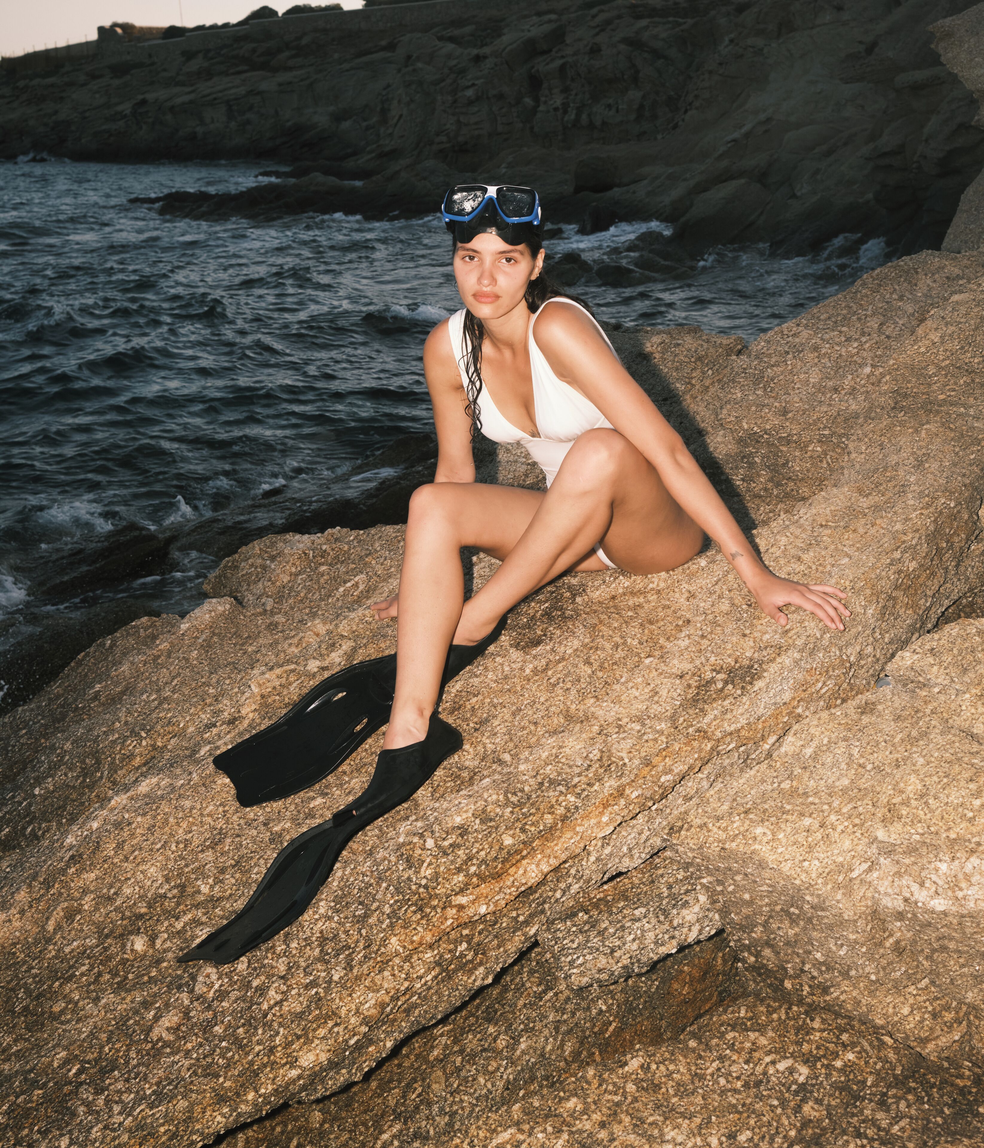 on the beach, sun-loungers, beach umbrellas, beach towels