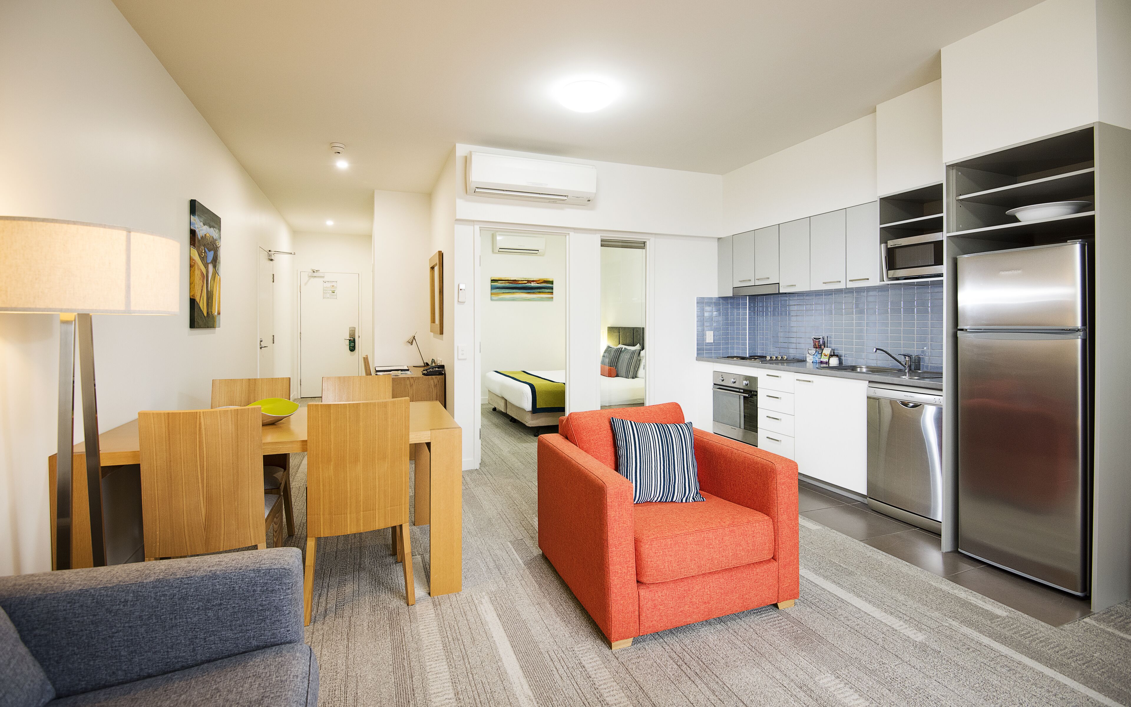 executive apartment, 2 bedrooms | living area | 42-inch flat-screen tv with digital channels, tv