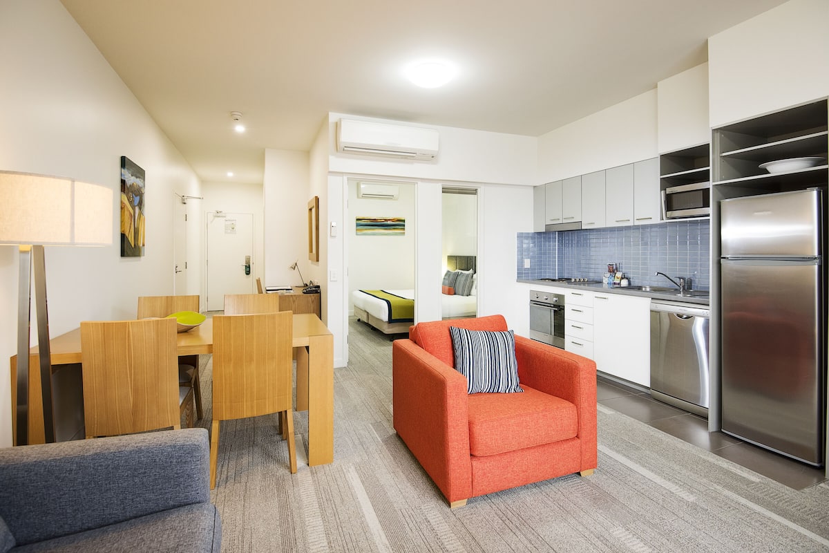 executive apartment, 2 bedrooms | living area | 42-inch flat-screen tv with digital channels, tv