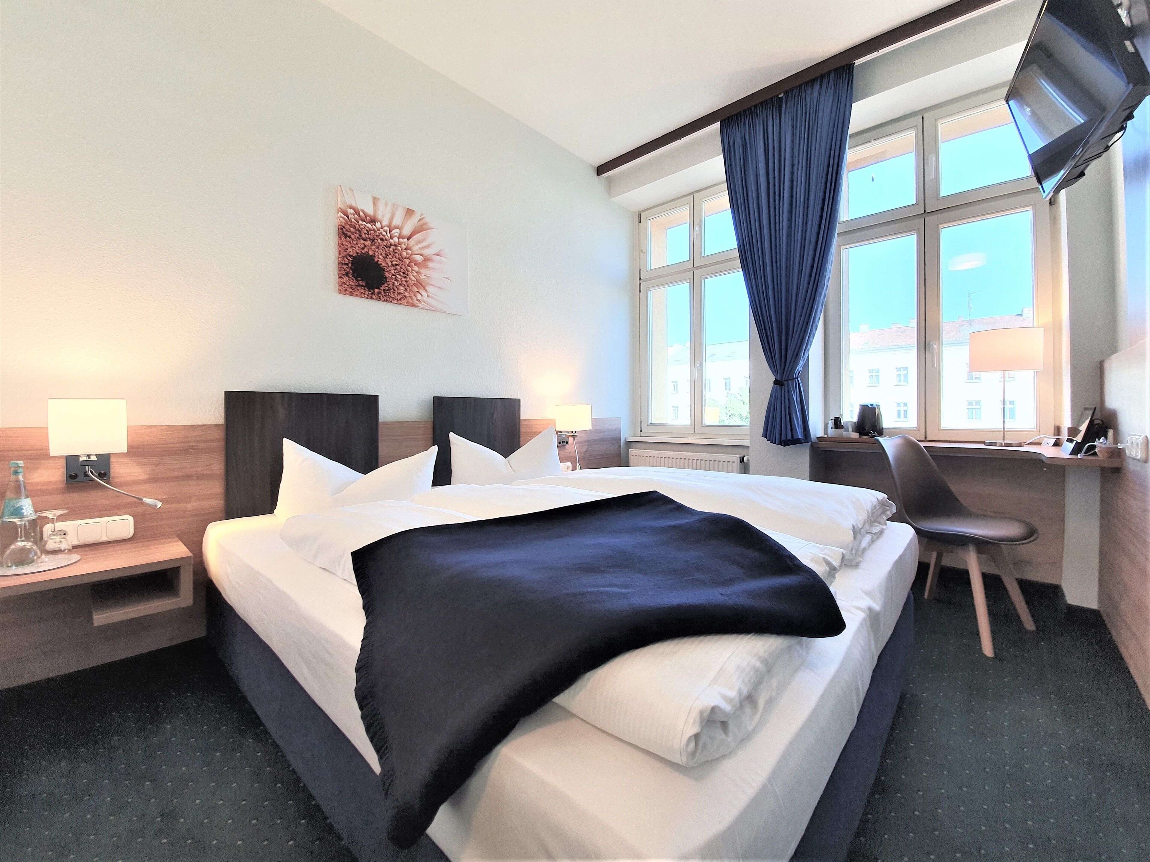 1 غرفة نوم وأغطية فراش متميزة وألحفة محشوة بالريش