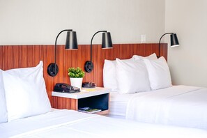 Standard Room, 2 Double Beds | Pillowtop beds, in-room safe, desk, laptop workspace