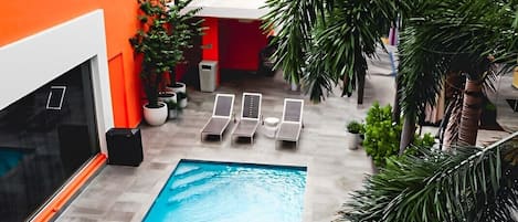 Outdoor pool, pool umbrellas, sun loungers