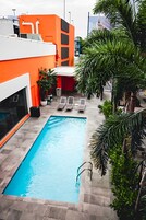 Outdoor pool, pool umbrellas, sun loungers