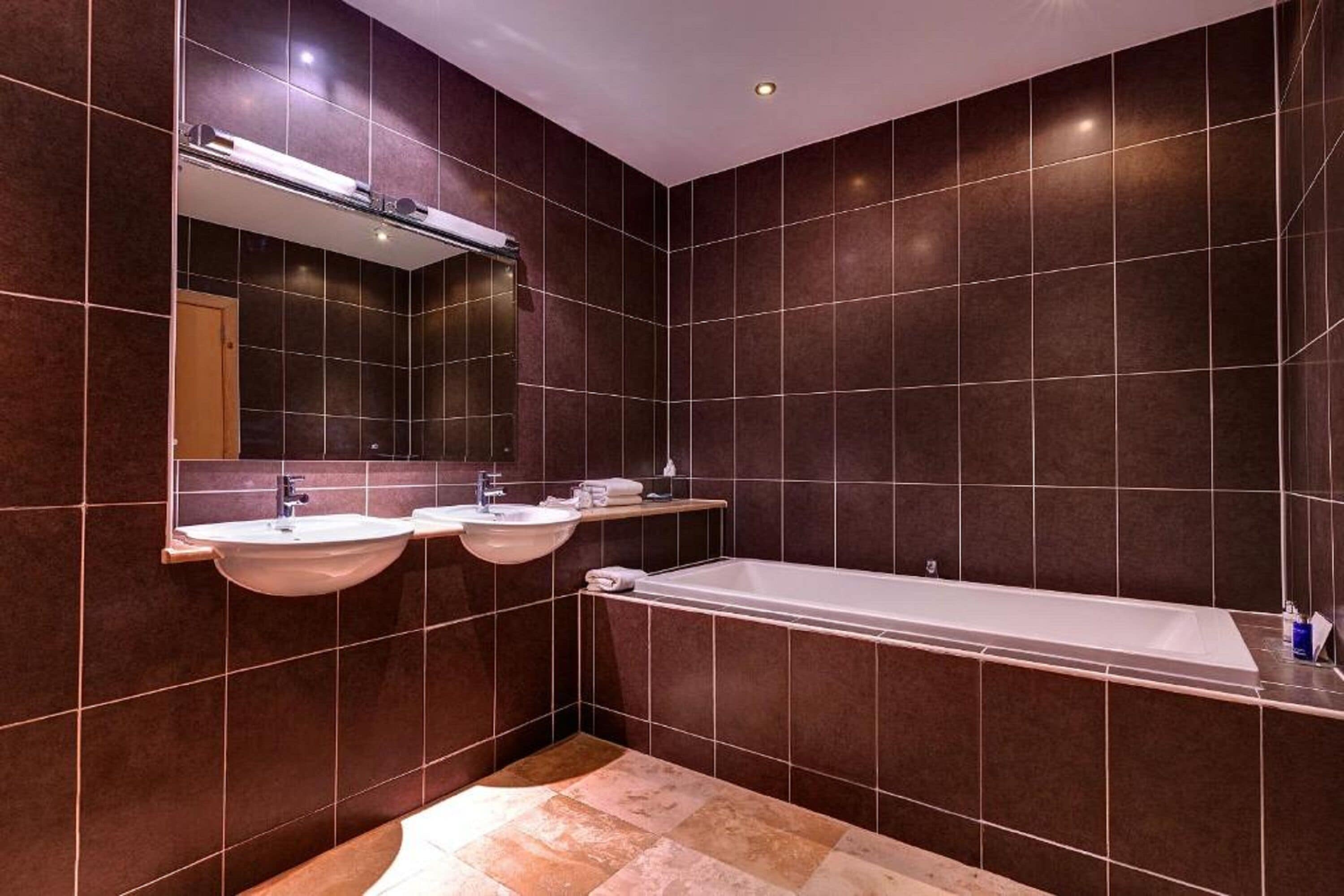 suite | bathroom | designer toiletries, hair dryer, towels