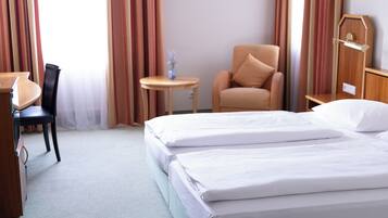 Basic Double Room, Shared Bathroom | In-room safe, blackout drapes, soundproofing, iron/ironing board