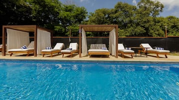 3 outdoor pools, open 7:00 AM to 7:00 PM, pool umbrellas