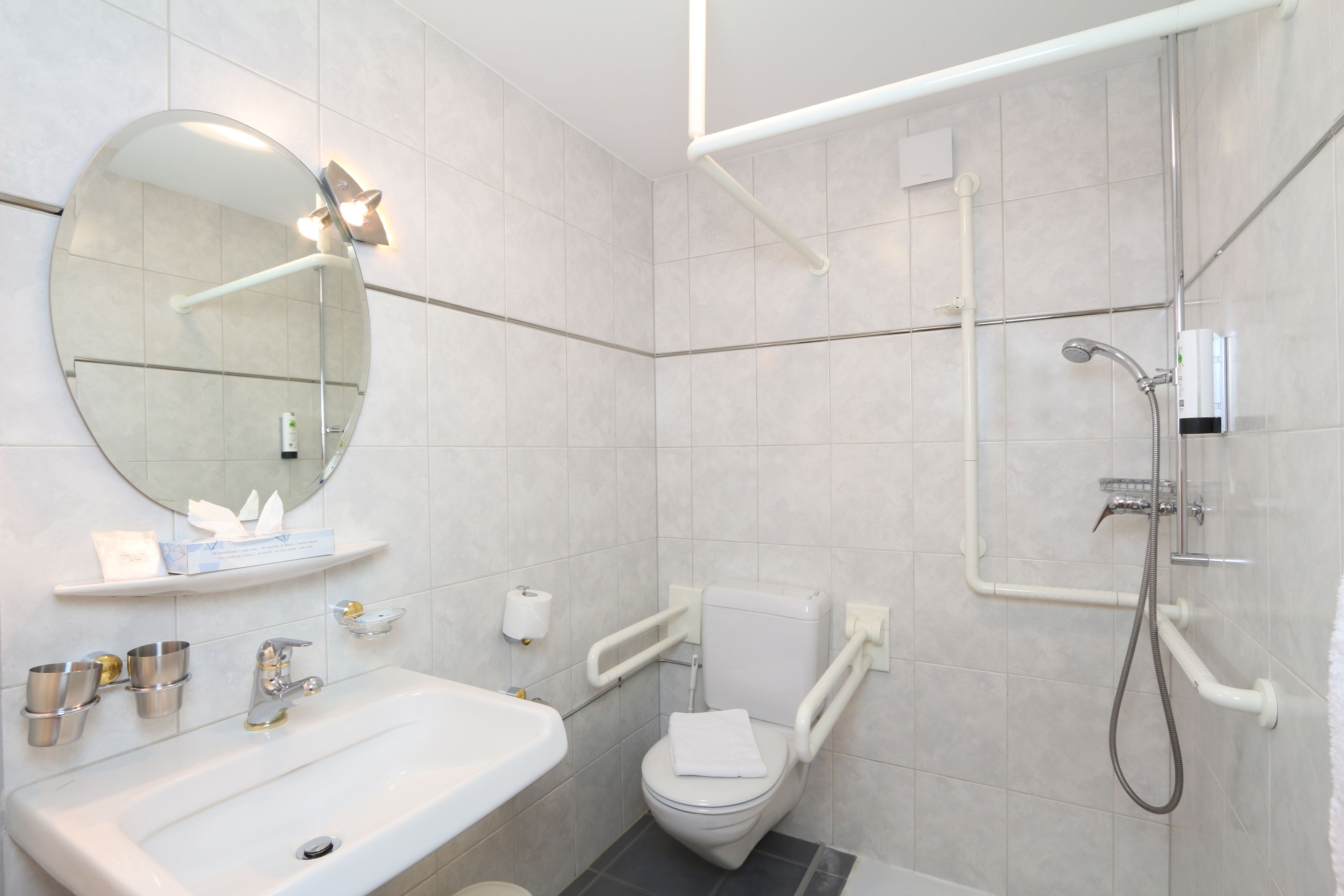 economy single room | bathroom | free toiletries, hair dryer, bathrobes, slippers