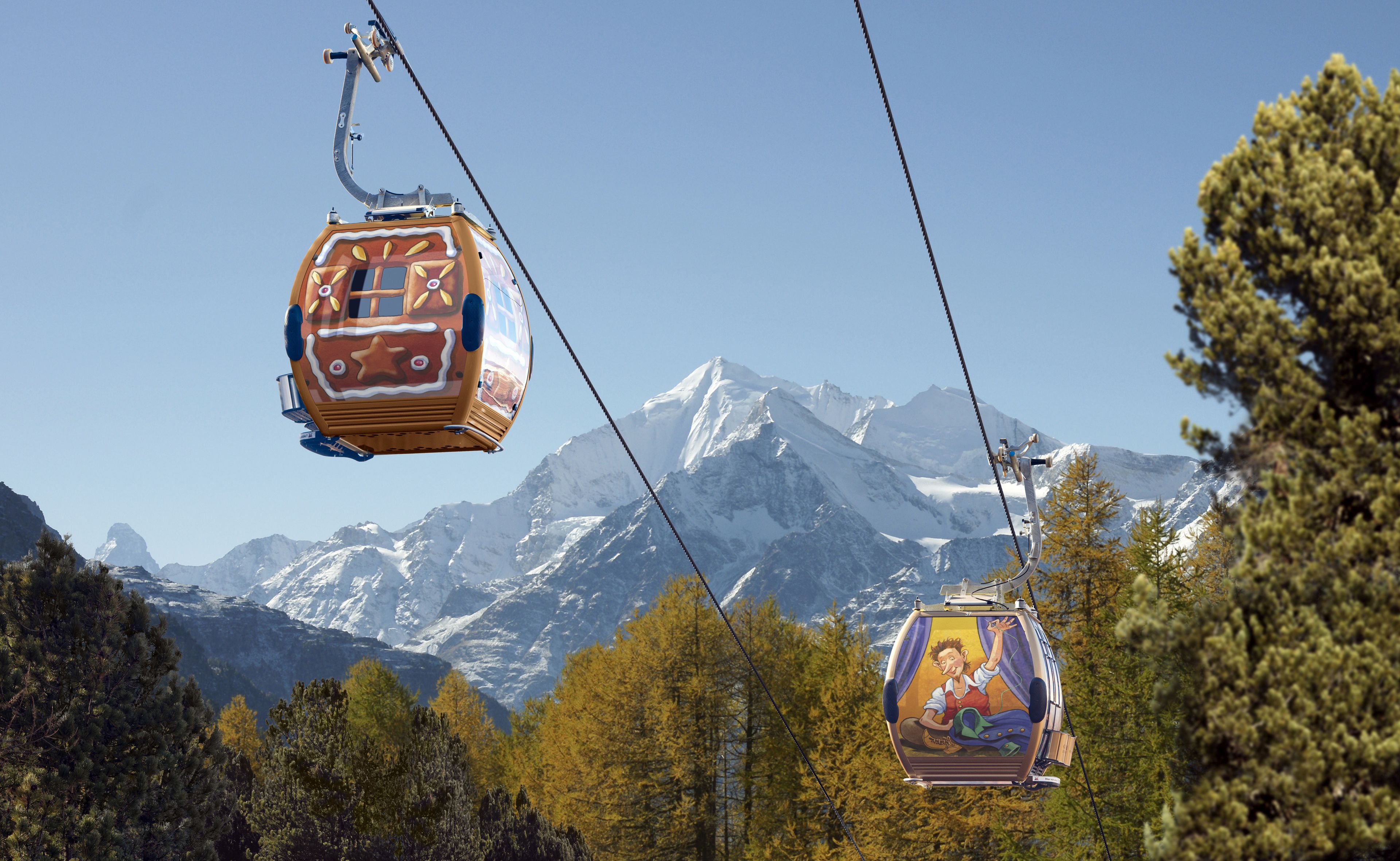 A cable car system with a mountainous backdrop.