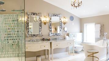 Separate tub and shower, deep soaking tub, designer toiletries