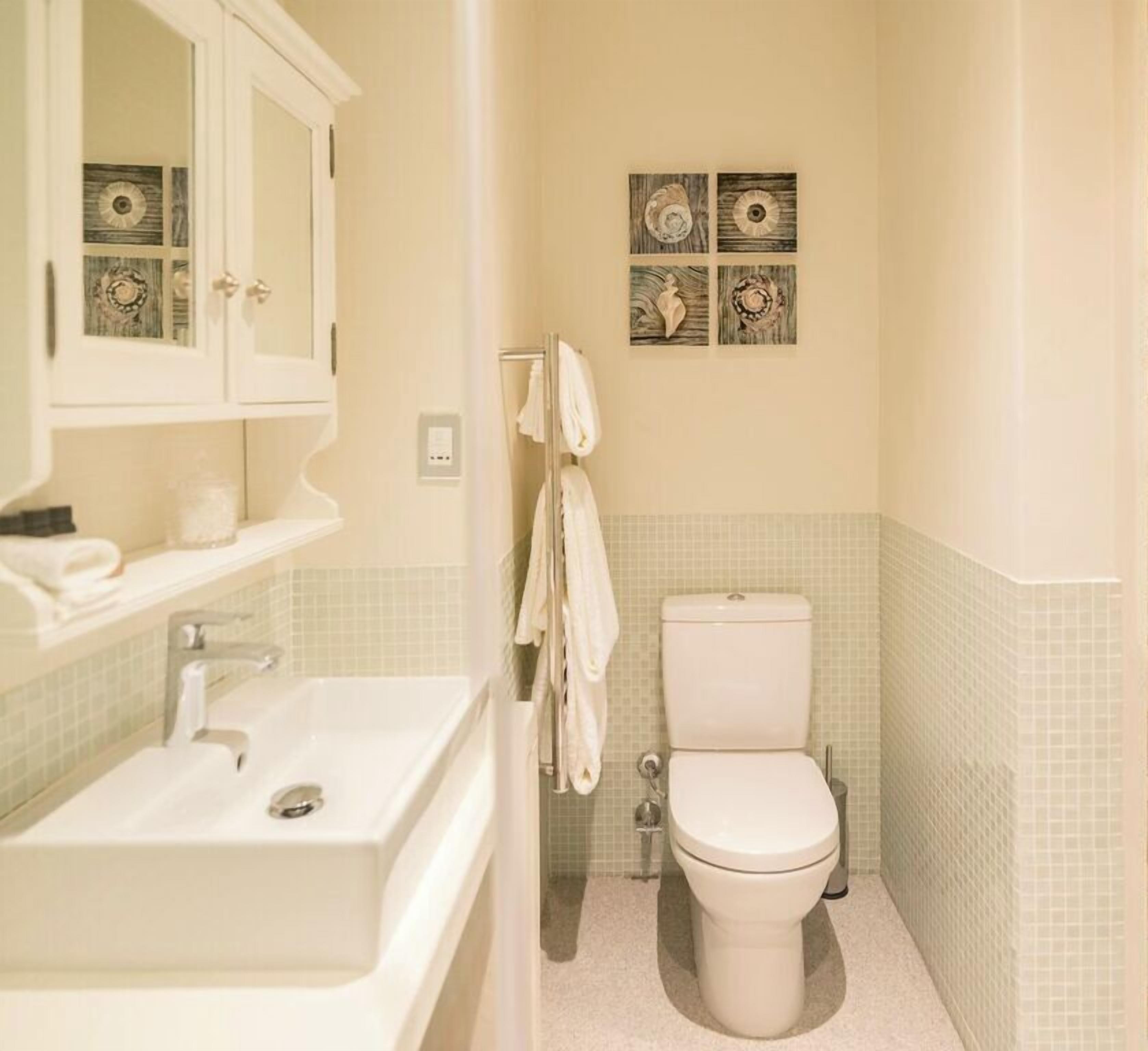 separate bathtub and shower, deep-soaking bathtub, designer toiletries