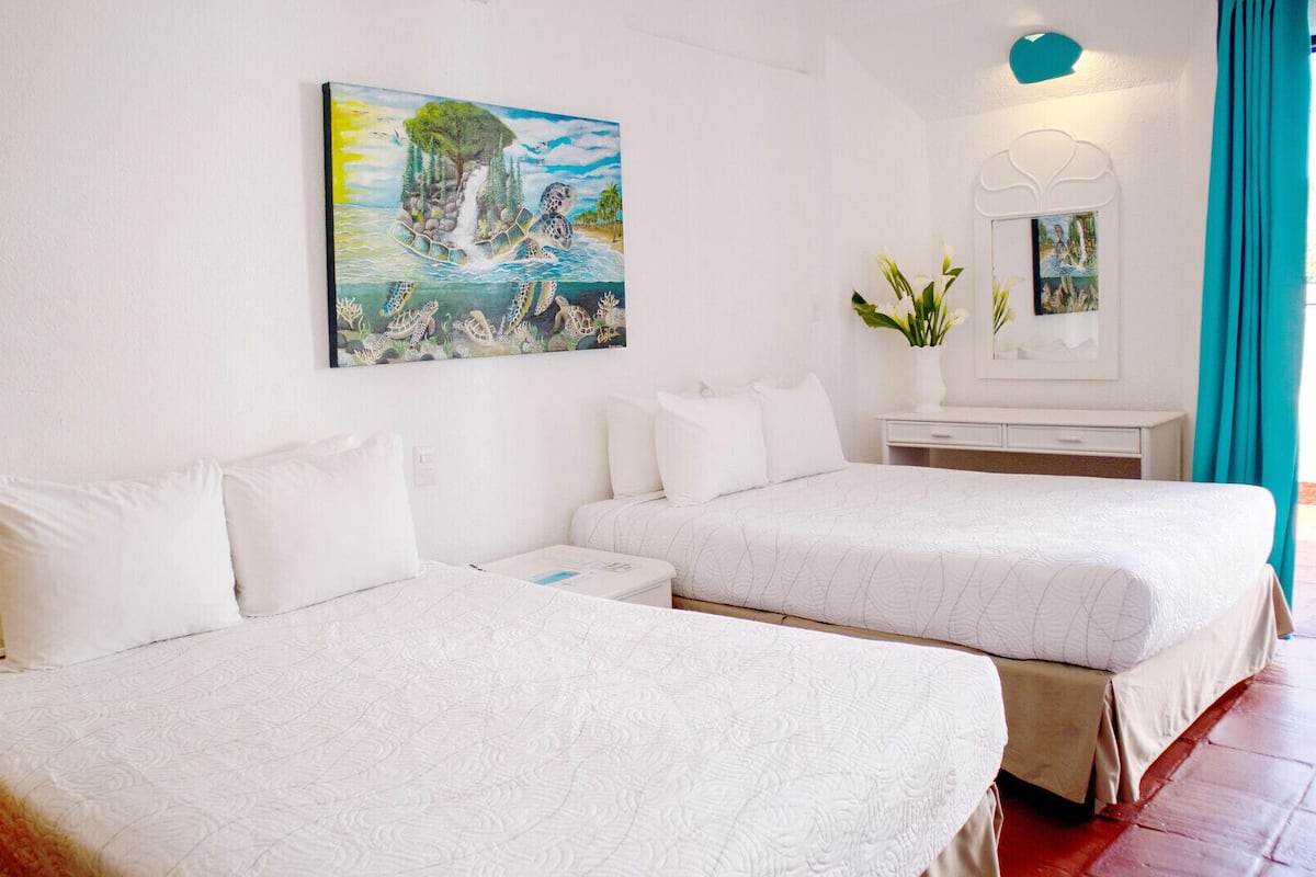 Luxe beddengoed, een kluis op de kamer, verduisterende gordijnen
