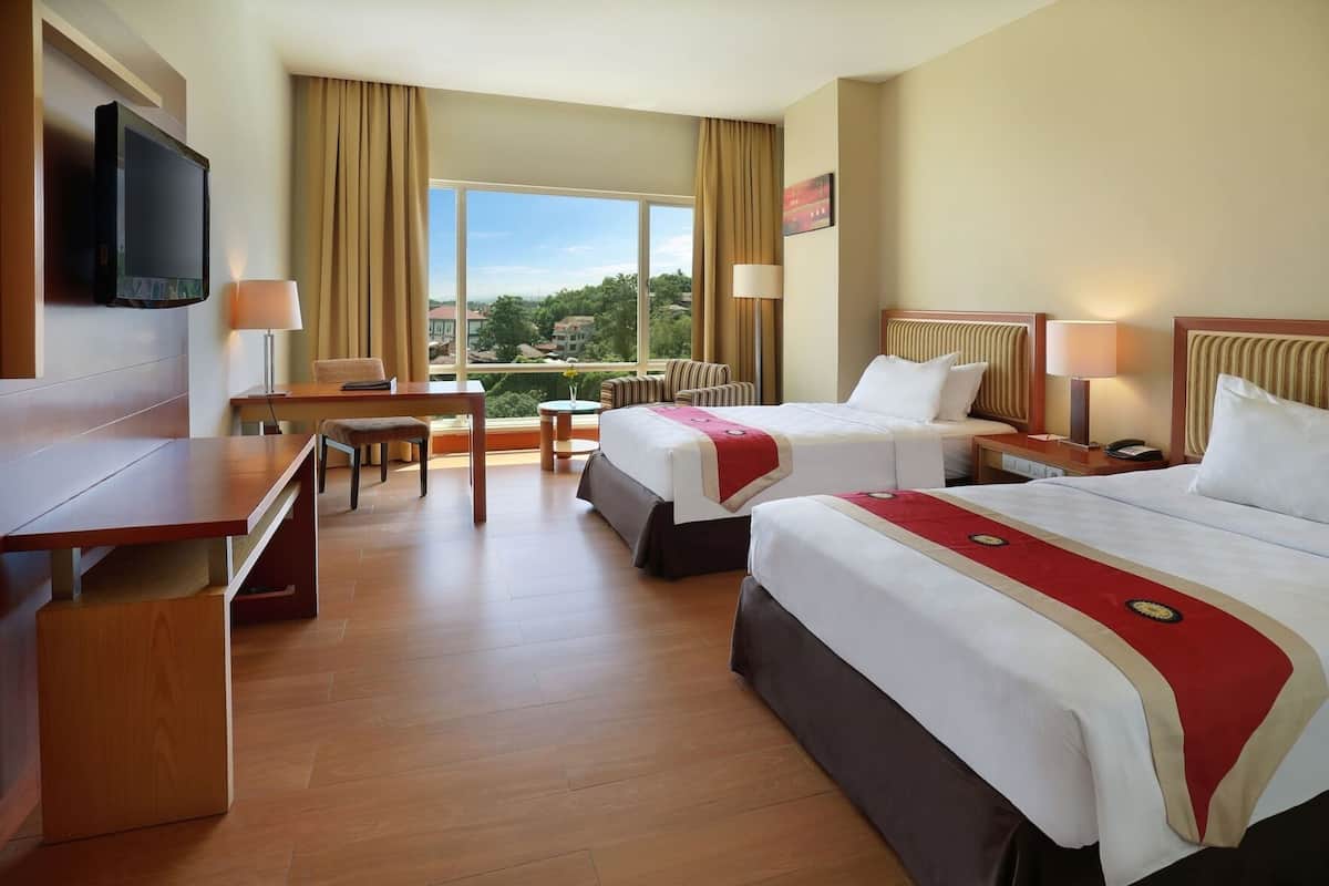 Ropa de cama de alta calidad y minibar
